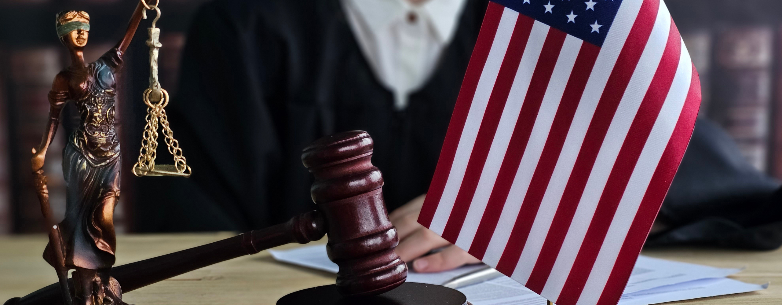 Goddess of Justice and US flag